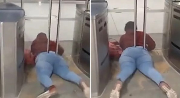 Mulher fica entalada durante tentativa de passagem em catraca